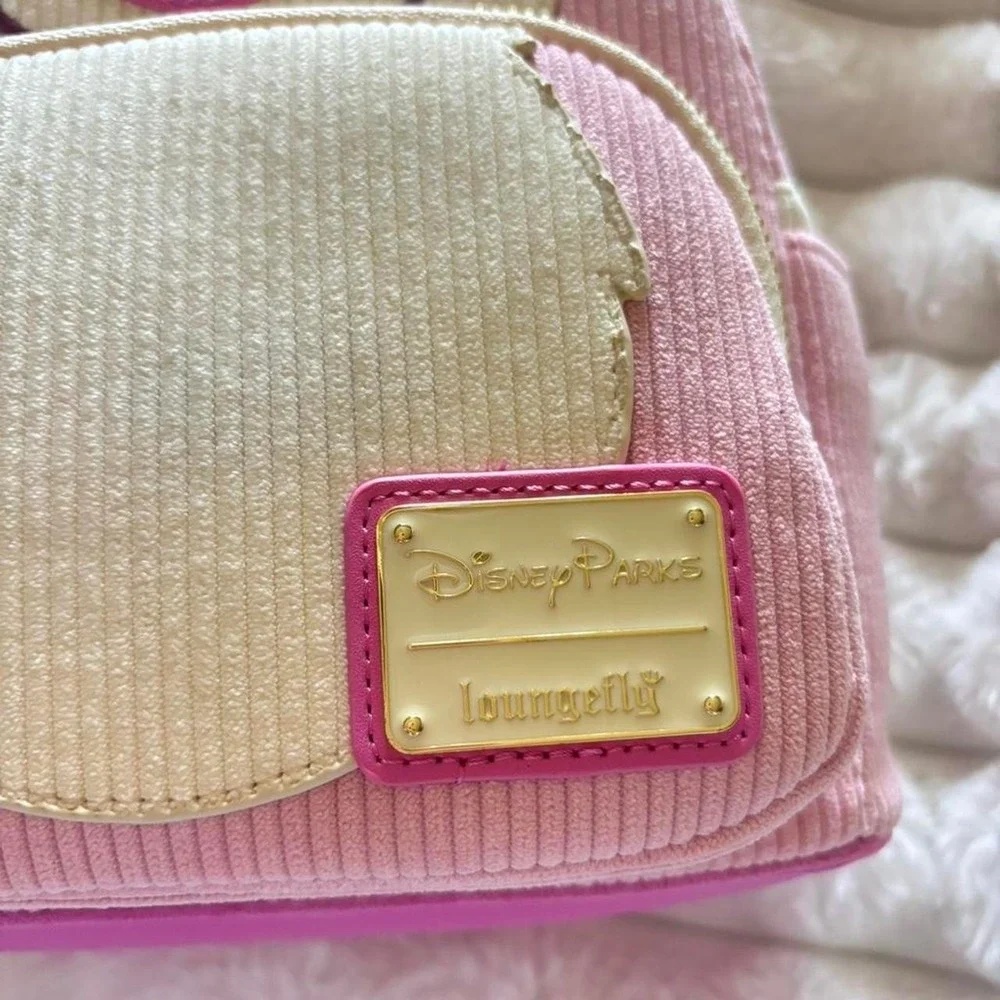 Disney Parks pink and cream Slinky lotso Loungefly backpack